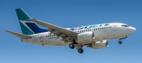 A WestJet 737-6CT arrives at Toronto Pearson in June 2014.  Photo:  Mark Thomas- OPShots Contributor